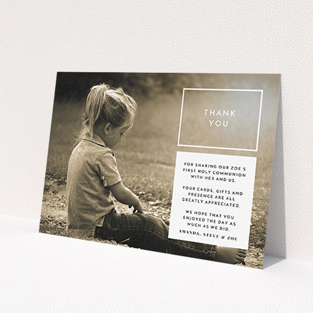 A communion thank you card called 'Modern Side Frame'. It is an A6 card in a landscape orientation. It is a photographic communion thank you card with room for 1 photo. 'Modern Side Frame' is available as a flat card, with mainly white colouring.