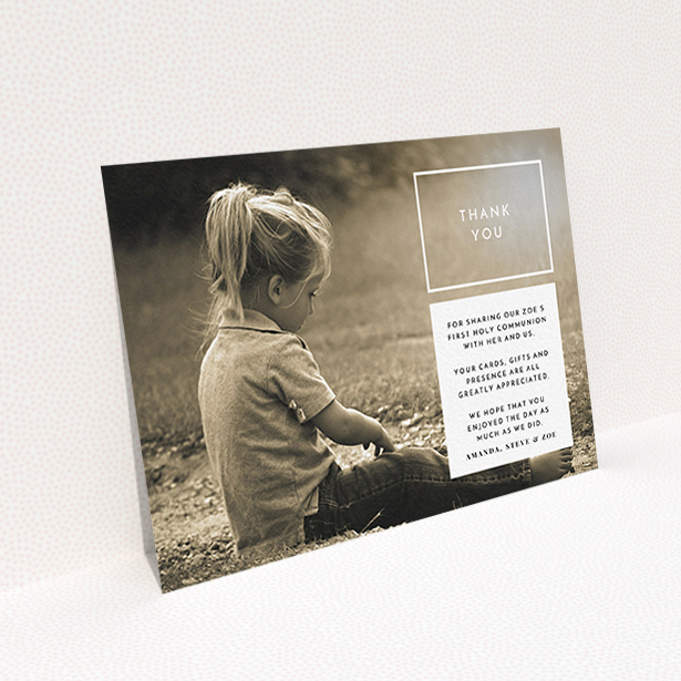 A communion thank you card called "Modern Side Frame". It is an A6 card in a landscape orientation. It is a photographic communion thank you card with room for 1 photo. "Modern Side Frame" is available as a flat card, with mainly white colouring.