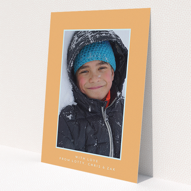A communion thank you card design titled 'Orange and Mint'. It is an A5 card in a portrait orientation. It is a photographic communion thank you card with room for 1 photo. 'Orange and Mint' is available as a flat card, with tones of orange and blue.
