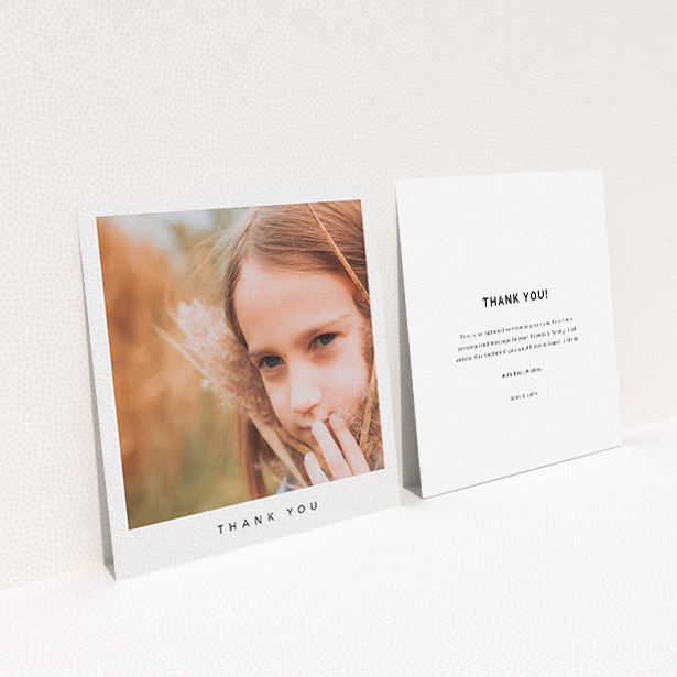 A communion thank you card named "Simple Thanks". It is a square (148mm x 148mm) card in a square orientation. It is a photographic communion thank you card with room for 1 photo. "Simple Thanks" is available as a flat card, with mainly white colouring.