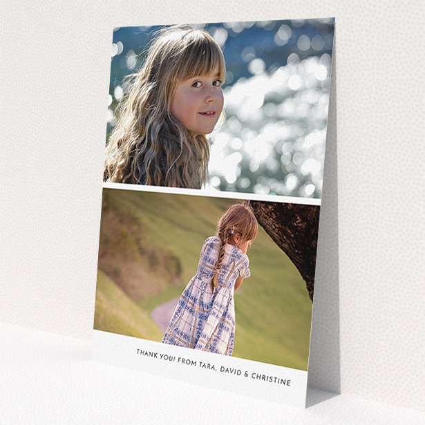 A communion thank you card named 'Stacked Landscapes'. It is an A5 card in a portrait orientation. It is a photographic communion thank you card with room for 2 photos. 'Stacked Landscapes' is available as a flat card, with mainly white colouring.