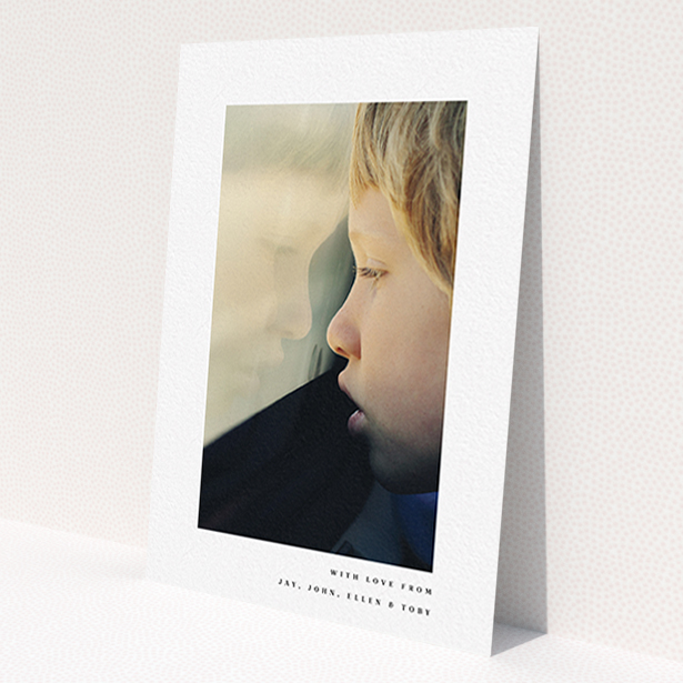 A communion thank you card template titled 'Thin Blue Frame'. It is an A6 card in a portrait orientation. It is a photographic communion thank you card with room for 1 photo. 'Thin Blue Frame' is available as a flat card, with mainly white colouring.