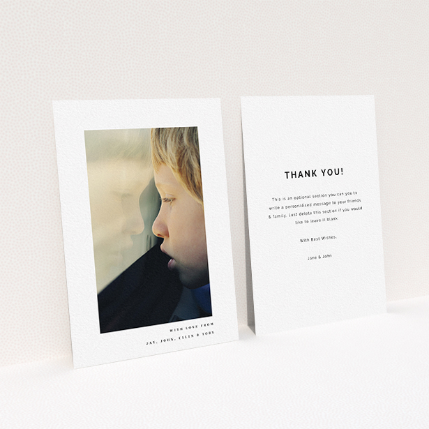 A communion thank you card template titled "Thin Blue Frame". It is an A6 card in a portrait orientation. It is a photographic communion thank you card with room for 1 photo. "Thin Blue Frame" is available as a flat card, with mainly white colouring.