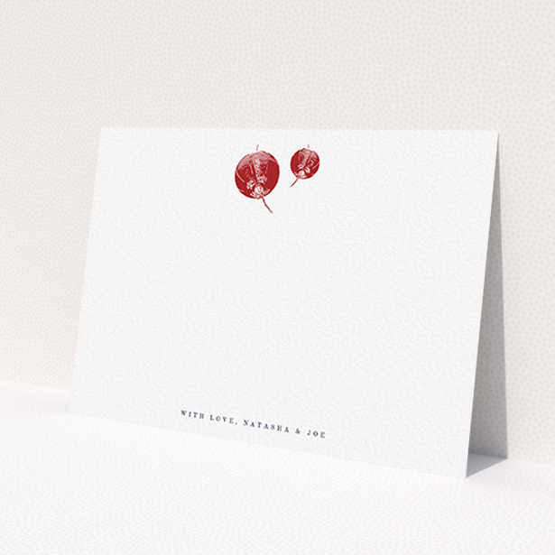 A couples custom writing stationery design titled 'Shanghai Nights'. It is an A6 card in a landscape orientation. 'Shanghai Nights' is available as a flat card, with tones of white and red.