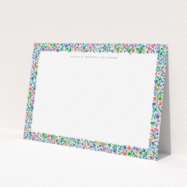 A couples personalised note card design called 'Spring smudge'. It is an A6 card in a landscape orientation. 'Spring smudge' is available as a flat card, with mainly green colouring.