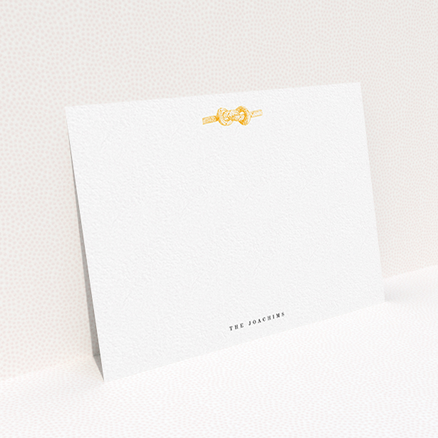 A couples personalised note card design named "Tie the knot". It is an A6 card in a landscape orientation. "Tie the knot" is available as a flat card, with tones of white and orange.