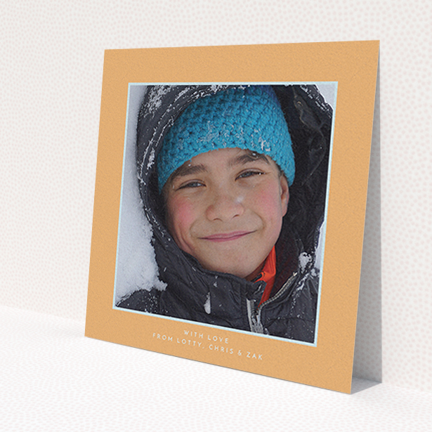 A first holy communion thank you card named 'Orange and Mint'. It is a square (148mm x 148mm) card in a square orientation. It is a photographic first holy communion thank you card with room for 1 photo. 'Orange and Mint' is available as a flat card, with tones of orange and blue.