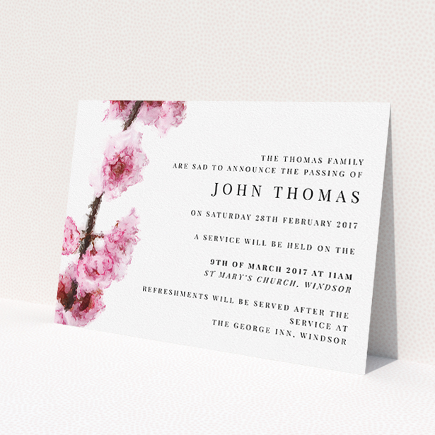 A funeral announcement card design named 'Blossom at an angle'. It is an A5 card in a landscape orientation. 'Blossom at an angle' is available as a flat card, with tones of pink and white.