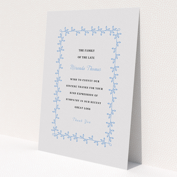 A funeral thank you card design called 'Surrounded by the forest'. It is an A5 card in a portrait orientation. 'Surrounded by the forest' is available as a flat card, with tones of light grey and light blue.