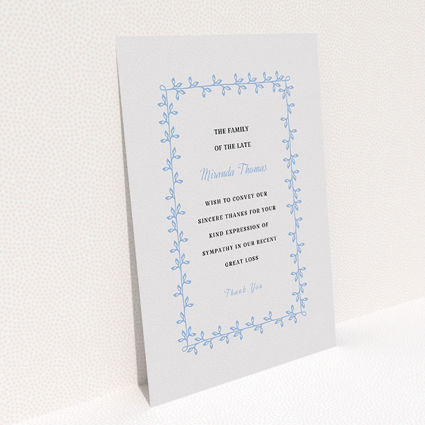 A funeral thank you card design called "Surrounded by the forest". It is an A5 card in a portrait orientation. "Surrounded by the forest" is available as a flat card, with tones of light grey and light blue.
