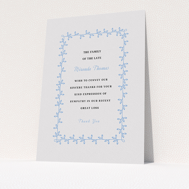 A funeral thank you card design called "Surrounded by the forest". It is an A5 card in a portrait orientation. "Surrounded by the forest" is available as a flat card, with tones of light grey and light blue.