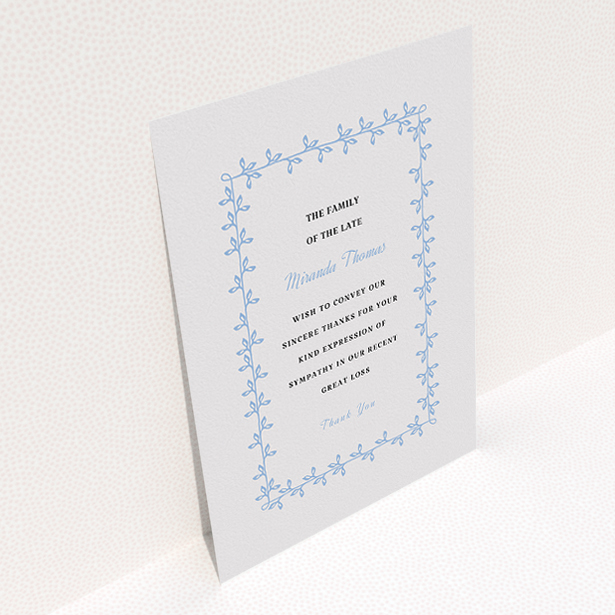 A funeral thank you card design called "Surrounded by the forest". It is an A5 card in a portrait orientation. "Surrounded by the forest" is available as a flat card, with tones of light grey and light blue.