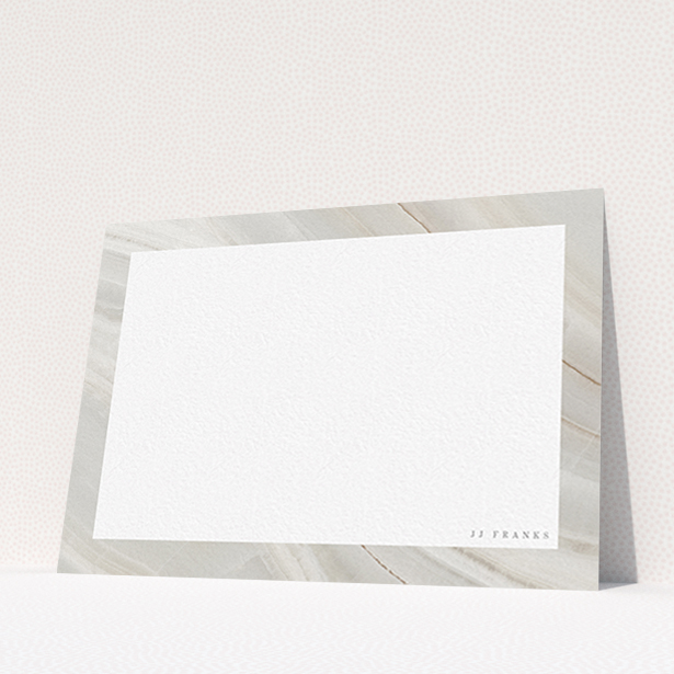 A ladies personalised note card named "Swells of marble". It is an A6 card in a landscape orientation. "Swells of marble" is available as a flat card, with tones of grey and white.