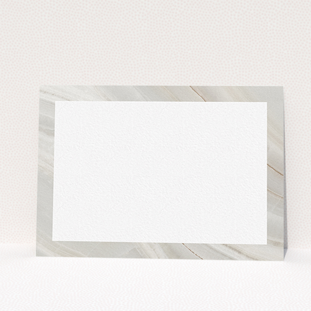 A ladies personalised note card named "Swells of marble". It is an A6 card in a landscape orientation. "Swells of marble" is available as a flat card, with tones of grey and white.