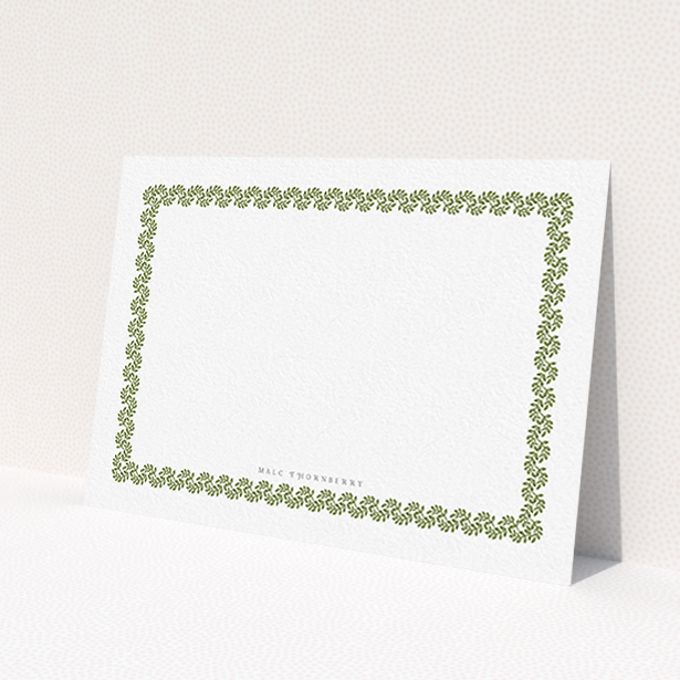 A men custom writing stationery design called 'Surrounded by the garden'. It is an A6 card in a landscape orientation. 'Surrounded by the garden' is available as a flat card, with mainly forest green colouring.