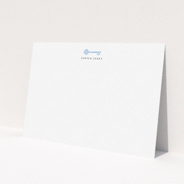 A mens correspondence card named 'The magic key'. It is an A6 card in a landscape orientation. 'The magic key' is available as a flat card, with tones of white and blue.