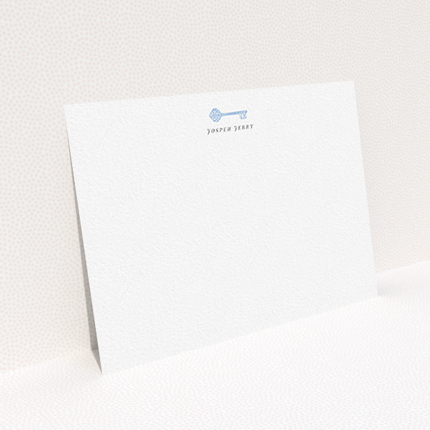 A mens correspondence card named "The magic key". It is an A6 card in a landscape orientation. "The magic key" is available as a flat card, with tones of white and blue.