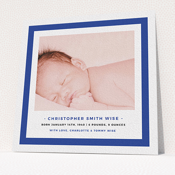 A new baby announcement card named "Big Blue". It is a square (148mm x 148mm) card in a square orientation. It is a photographic new baby announcement card with room for 1 photo. "Big Blue" is available as a flat card, with tones of blue and white.