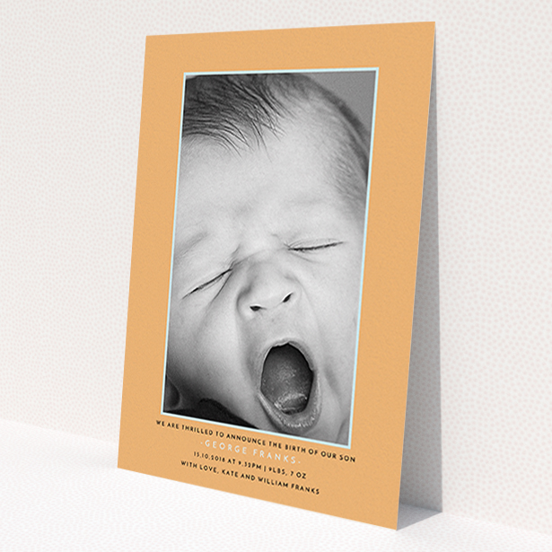 A new baby announcement card design titled 'Orange and Mint'. It is an A6 card in a portrait orientation. It is a photographic new baby announcement card with room for 1 photo. 'Orange and Mint' is available as a flat card, with tones of orange and blue.