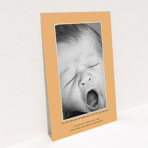 A new baby announcement card design titled "Orange and Mint". It is an A6 card in a portrait orientation. It is a photographic new baby announcement card with room for 1 photo. "Orange and Mint" is available as a flat card, with tones of orange and blue.