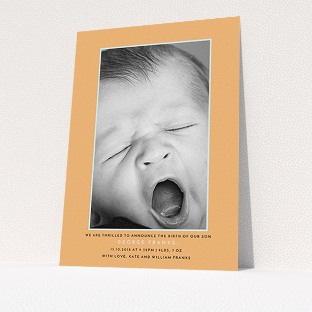 A new baby announcement card design titled "Orange and Mint". It is an A6 card in a portrait orientation. It is a photographic new baby announcement card with room for 1 photo. "Orange and Mint" is available as a flat card, with tones of orange and blue.