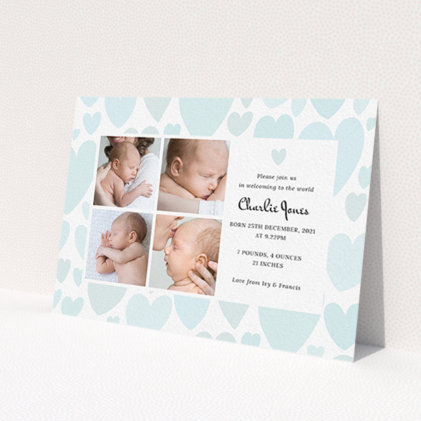 A new baby announcement card design named 'Pastel Hearts'. It is an A6 card in a landscape orientation. It is a photographic new baby announcement card with room for 4 photos. 'Pastel Hearts' is available as a flat card, with tones of blue and white.