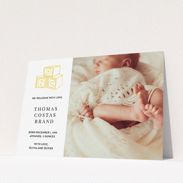 A new baby announcement card template titled "Playtime". It is an A5 card in a landscape orientation. It is a photographic new baby announcement card with room for 1 photo. "Playtime" is available as a flat card, with tones of white and yellow.