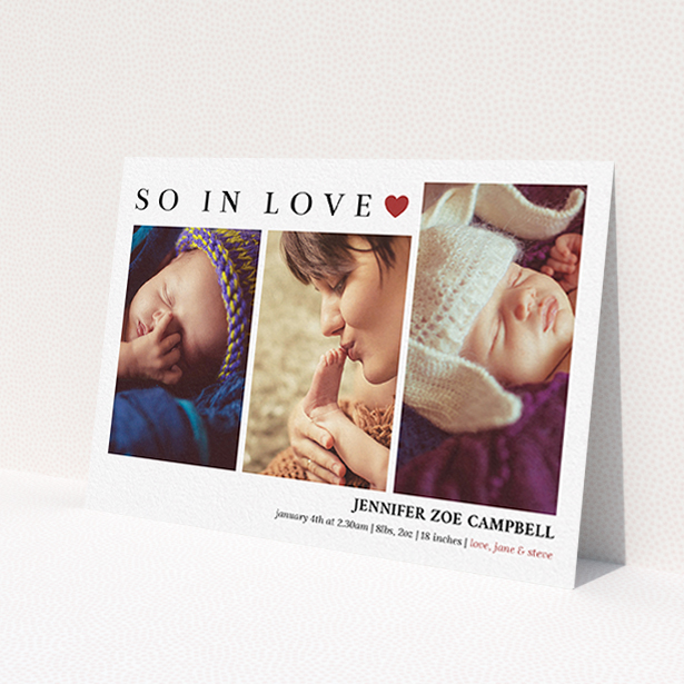 A new baby announcement card design titled 'So In Love'. It is an A6 card in a landscape orientation. It is a photographic new baby announcement card with room for 3 photos. 'So In Love' is available as a flat card, with tones of white and red.