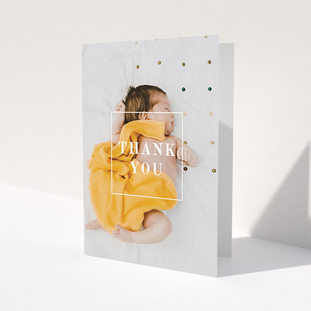 A new baby thank you card design called 'Central Thanks'. It is an A6 card in a portrait orientation. It is a photographic new baby thank you card with room for 1 photo. 'Central Thanks' is available as a folded card, with mainly white colouring.