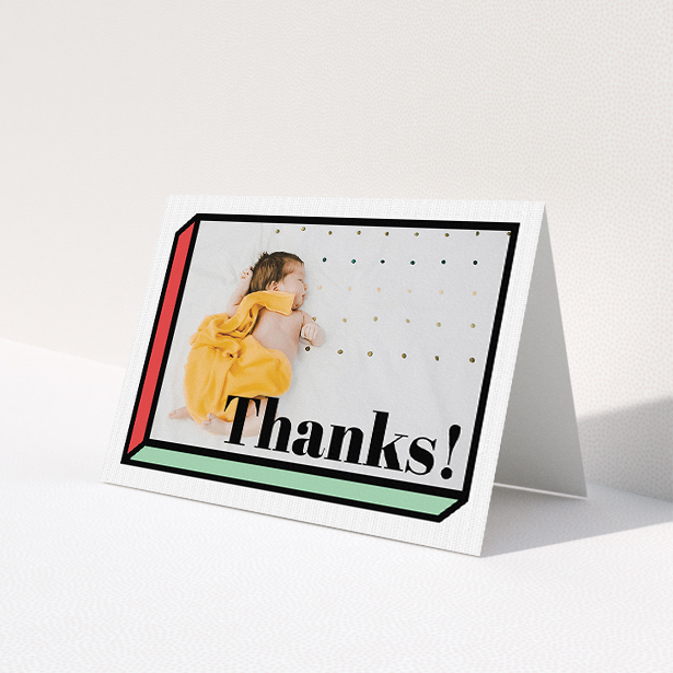 A new baby thank you card template titled 'Chip Off The Old Block'. It is an A5 card in a landscape orientation. It is a photographic new baby thank you card with room for 1 photo. 'Chip Off The Old Block' is available as a folded card, with tones of green and red.