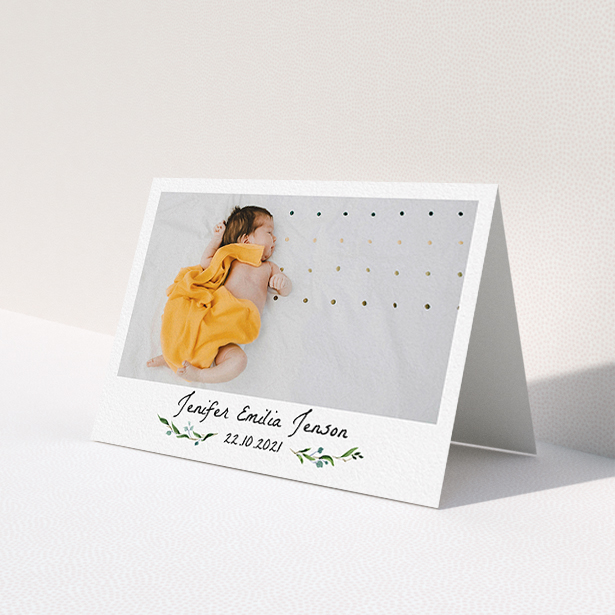 A new baby thank you card called 'Classic Floral'. It is an A6 card in a landscape orientation. It is a photographic new baby thank you card with room for 1 photo. 'Classic Floral' is available as a folded card, with tones of black and white.