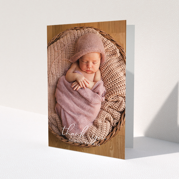 A new baby thank you card design named 'Classic Thank You'. It is an A6 card in a portrait orientation. It is a photographic new baby thank you card with room for 1 photo. 'Classic Thank You' is available as a folded card, with mainly white colouring.