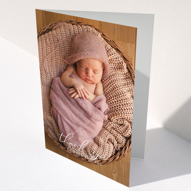 A new baby thank you card design named "Classic Thank You". It is an A6 card in a portrait orientation. It is a photographic new baby thank you card with room for 1 photo. "Classic Thank You" is available as a folded card, with mainly white colouring.