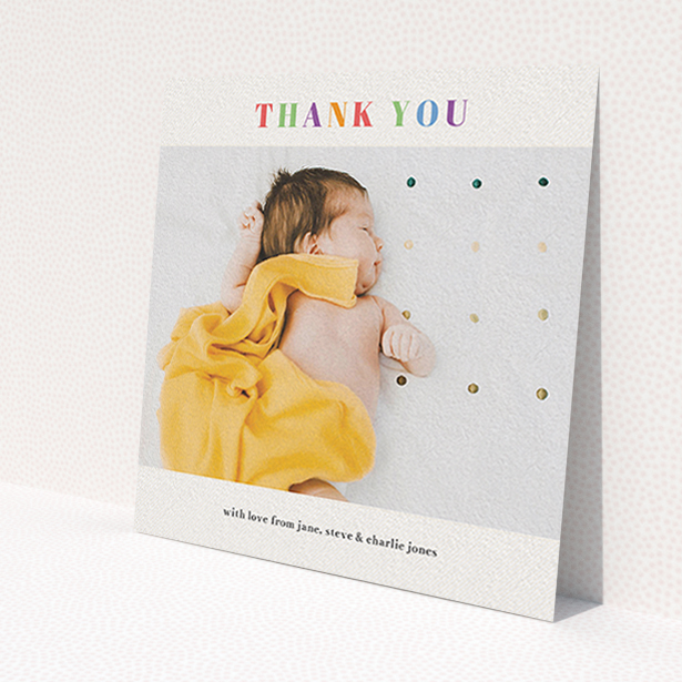 A new baby thank you card called 'Colourful Thanks'. It is a square (148mm x 148mm) card in a square orientation. It is a photographic new baby thank you card with room for 1 photo. 'Colourful Thanks' is available as a flat card, with tones of white and green.