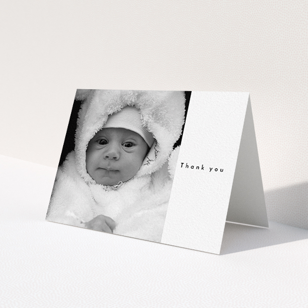 A new baby thank you card template titled 'Most of the Page Frame'. It is an A6 card in a landscape orientation. It is a photographic new baby thank you card with room for 1 photo. 'Most of the Page Frame' is available as a folded card, with mainly white colouring.