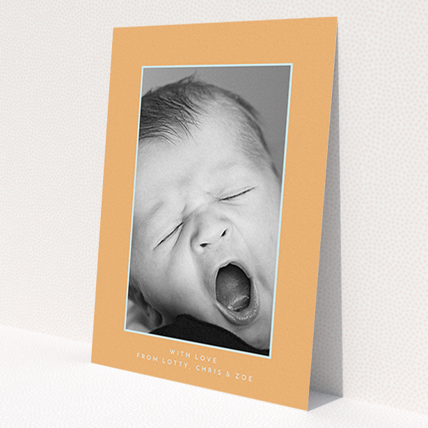 A new baby thank you card design named 'Orange and Mint'. It is an A6 card in a portrait orientation. It is a photographic new baby thank you card with room for 1 photo. 'Orange and Mint' is available as a flat card, with tones of orange and blue.