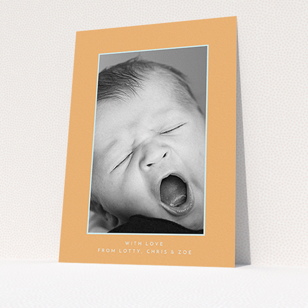 A new baby thank you card design named "Orange and Mint". It is an A6 card in a portrait orientation. It is a photographic new baby thank you card with room for 1 photo. "Orange and Mint" is available as a flat card, with tones of orange and blue.