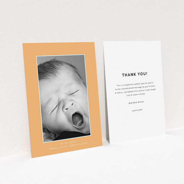 A new baby thank you card design named "Orange and Mint". It is an A6 card in a portrait orientation. It is a photographic new baby thank you card with room for 1 photo. "Orange and Mint" is available as a flat card, with tones of orange and blue.