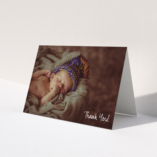 A new baby thank you card design named 'Rough but Simple Photo'. It is an A6 card in a landscape orientation. It is a photographic new baby thank you card with room for 1 photo. 'Rough but Simple Photo' is available as a folded card, with mainly white colouring.