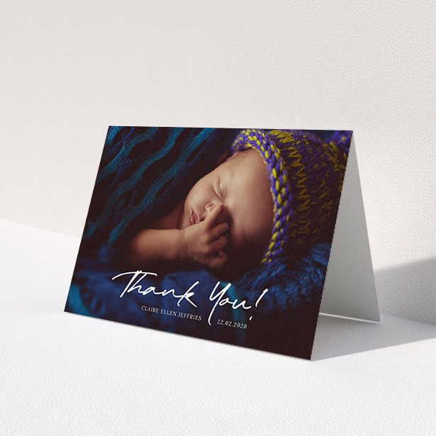 A new baby thank you card design titled 'Simple Appreciation'. It is an A6 card in a landscape orientation. It is a photographic new baby thank you card with room for 1 photo. 'Simple Appreciation' is available as a folded card, with mainly white colouring.