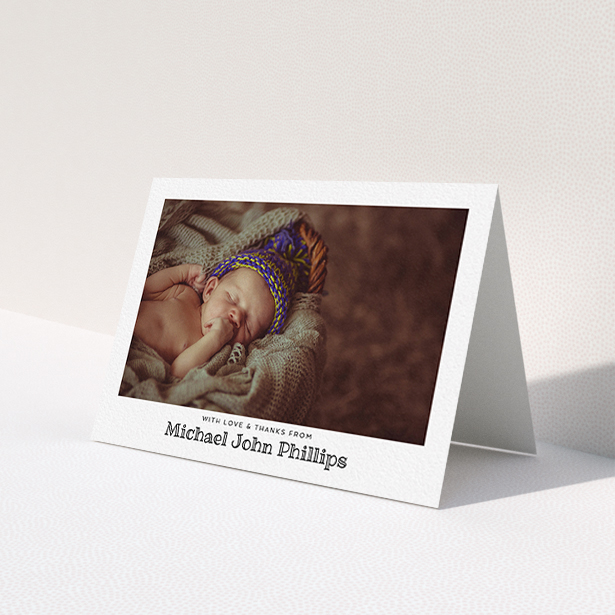 A new baby thank you card design called 'Simple Photo Frame'. It is an A6 card in a landscape orientation. It is a photographic new baby thank you card with room for 1 photo. 'Simple Photo Frame' is available as a folded card, with mainly white colouring.