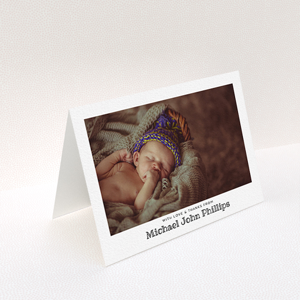 A new baby thank you card design called "Simple Photo Frame". It is an A6 card in a landscape orientation. It is a photographic new baby thank you card with room for 1 photo. "Simple Photo Frame" is available as a folded card, with mainly white colouring.