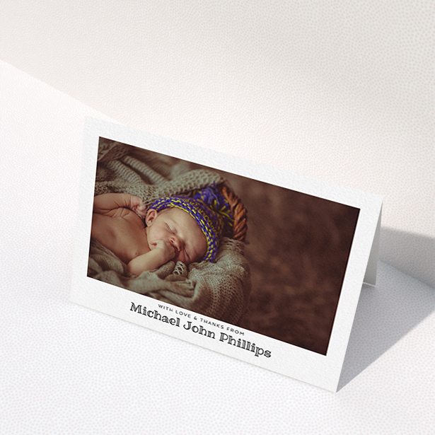 A new baby thank you card design called "Simple Photo Frame". It is an A6 card in a landscape orientation. It is a photographic new baby thank you card with room for 1 photo. "Simple Photo Frame" is available as a folded card, with mainly white colouring.