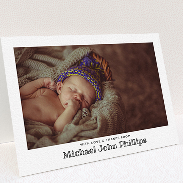 A new baby thank you card design called "Simple Photo Frame". It is an A6 card in a landscape orientation. It is a photographic new baby thank you card with room for 1 photo. "Simple Photo Frame" is available as a folded card, with mainly white colouring.