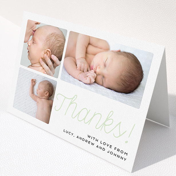 A new baby thank you card called "Thank You Cursive". It is an A5 card in a landscape orientation. It is a photographic new baby thank you card with room for 3 photos. "Thank You Cursive" is available as a folded card, with tones of white and green.