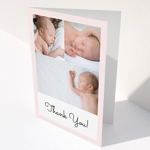 A new baby thank you card template titled "Thank You!". It is an A5 card in a portrait orientation. It is a photographic new baby thank you card with room for 3 photos. "Thank You!" is available as a folded card, with tones of pink and white.
