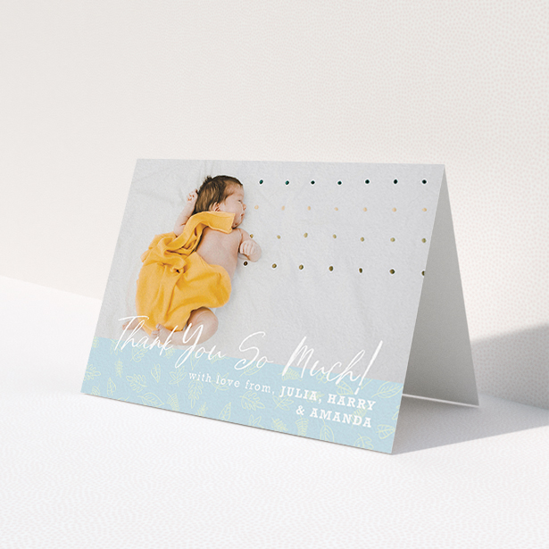 A new baby thank you card design titled 'Thank You So Much'. It is an A6 card in a landscape orientation. It is a photographic new baby thank you card with room for 1 photo. 'Thank You So Much' is available as a folded card, with mainly blue colouring.