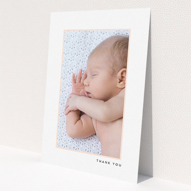 A new baby thank you card design titled 'Thin Pink Frame'. It is an A5 card in a portrait orientation. It is a photographic new baby thank you card with room for 1 photo. 'Thin Pink Frame' is available as a flat card, with tones of white and pink.