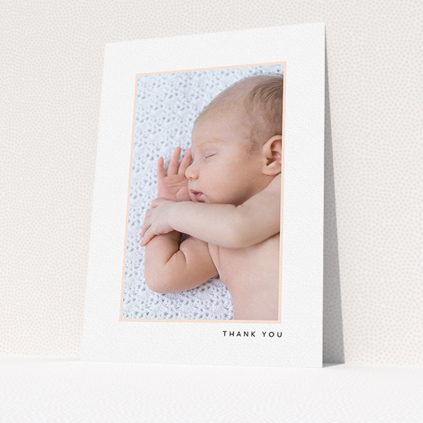 A new baby thank you card design titled "Thin Pink Frame". It is an A5 card in a portrait orientation. It is a photographic new baby thank you card with room for 1 photo. "Thin Pink Frame" is available as a flat card, with tones of white and pink.