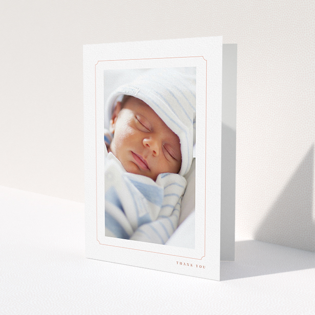 A new baby thank you card design titled 'Thin Pink'. It is an A5 card in a portrait orientation. It is a photographic new baby thank you card with room for 1 photo. 'Thin Pink' is available as a folded card, with tones of white and pink.